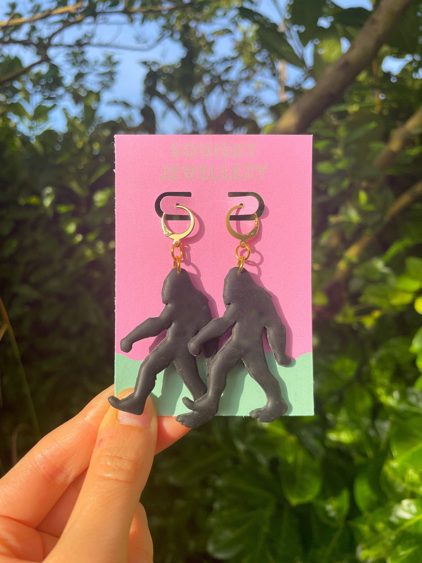 Black Bigfoot Monster Earrings Polymer Clay Horror Cryptid-Inspired Gold Huggie Hoops, Spooky Cute Goth Kitsch Conspiracy Gift