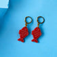 Red Fish Acrylic Earrings on Gold Huggie Hoops
