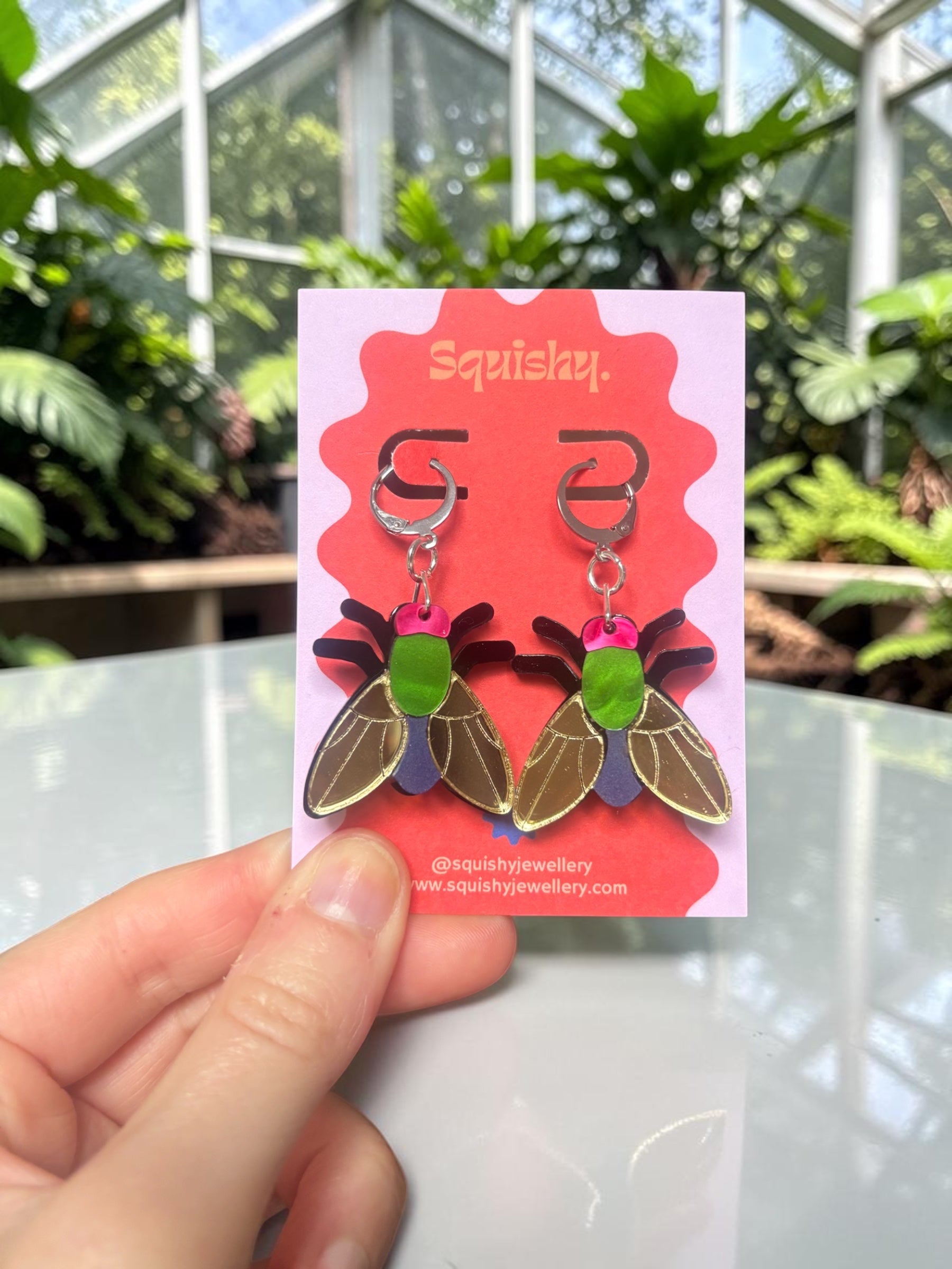 Gold Fly huggie hoop earrings inspired by natural history museums, curiosity cabinets, and whimsigoth fashion.