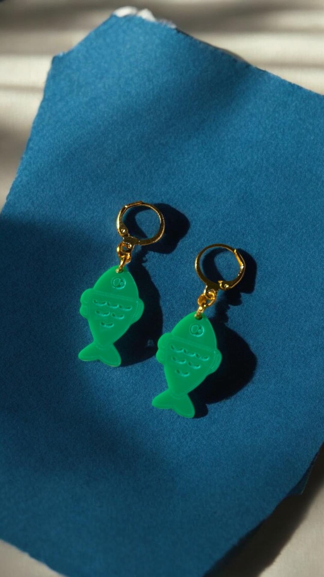 Green Fish Acrylic Earrings on Gold Huggie Hoops