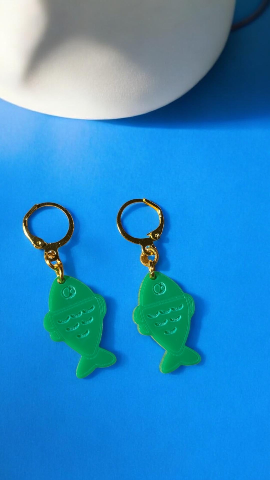 Green Fish Acrylic Earrings on Gold Huggie Hoops