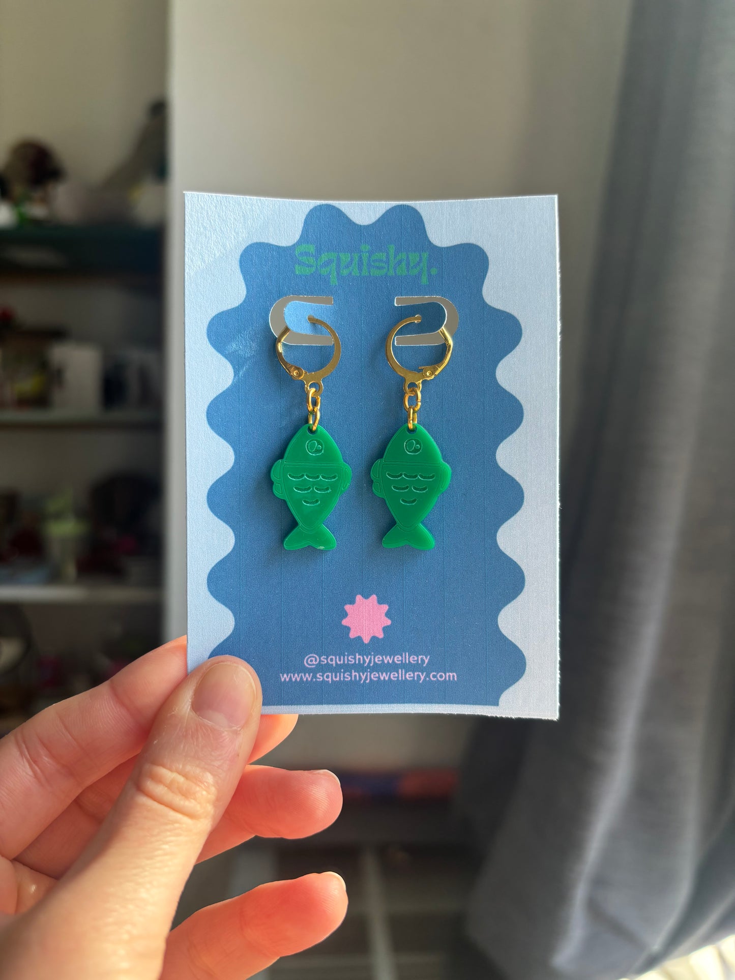 Green Fish Acrylic Earrings on Gold Huggie Hoops