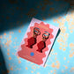 Red Fish Acrylic Earrings on Gold Huggie Hoops
