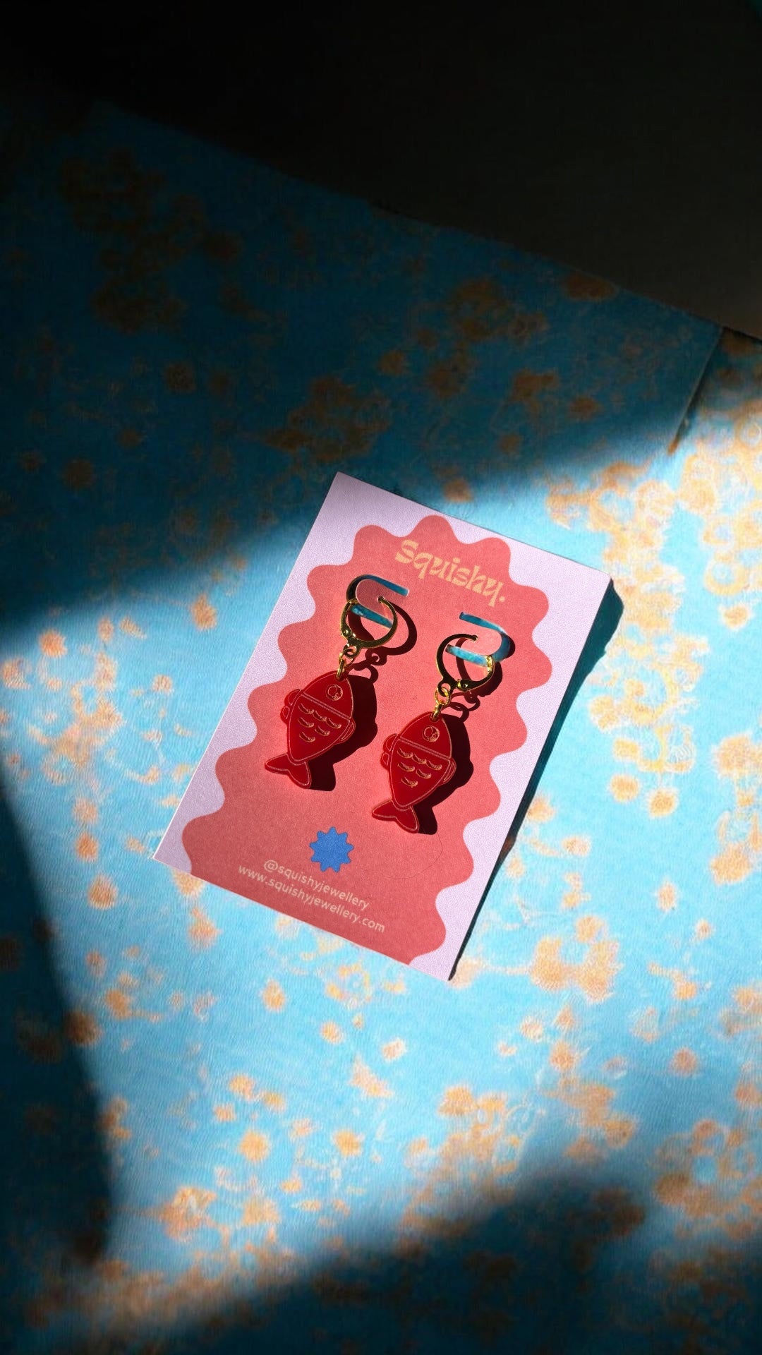 Red Fish Acrylic Earrings on Gold Huggie Hoops