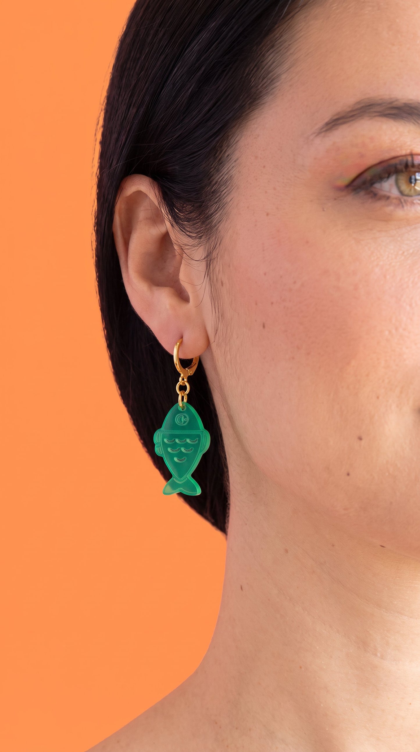 Green Fish Acrylic Earrings on Gold Huggie Hoops
