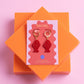 Red Fish Acrylic Earrings on Gold Huggie Hoops