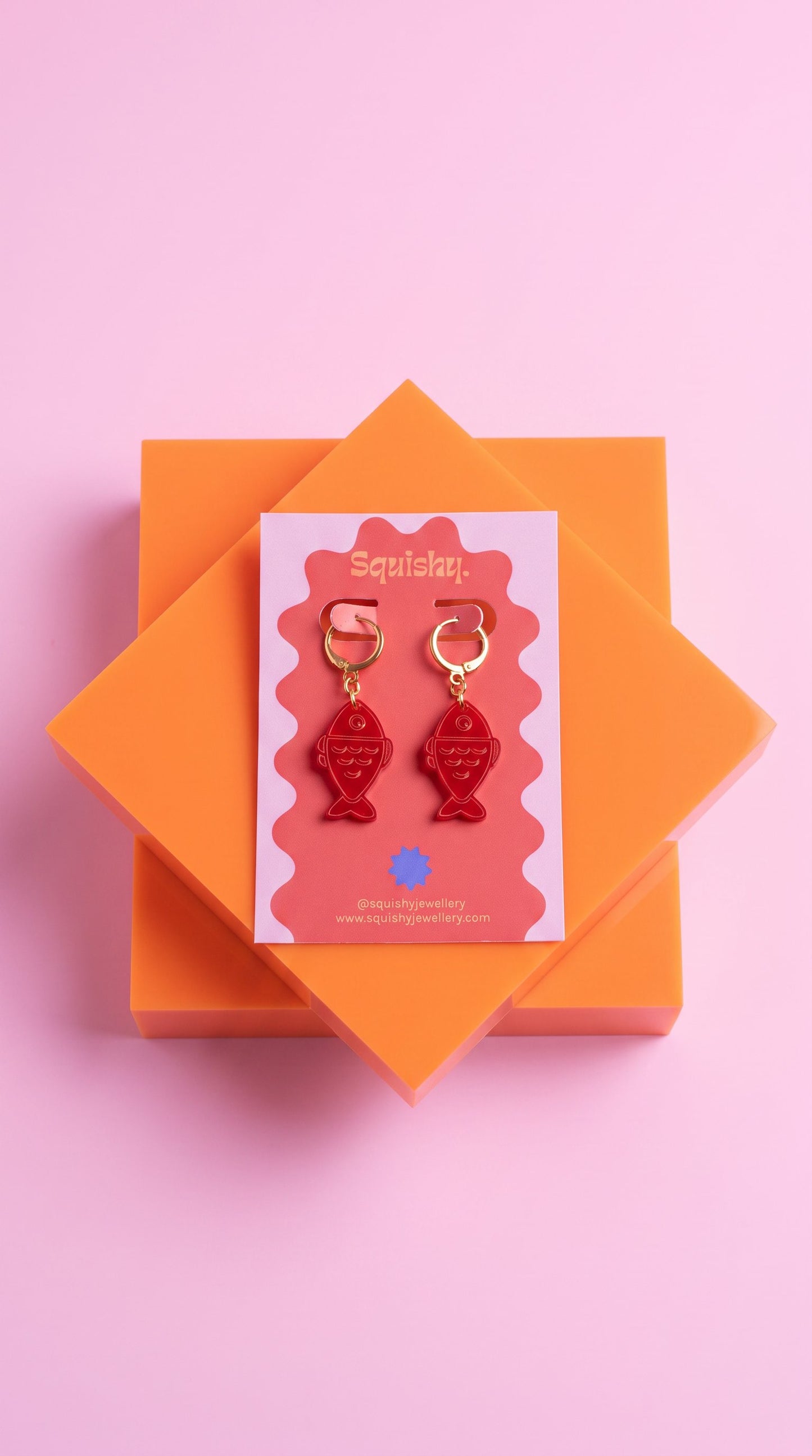 Red Fish Acrylic Earrings on Gold Huggie Hoops