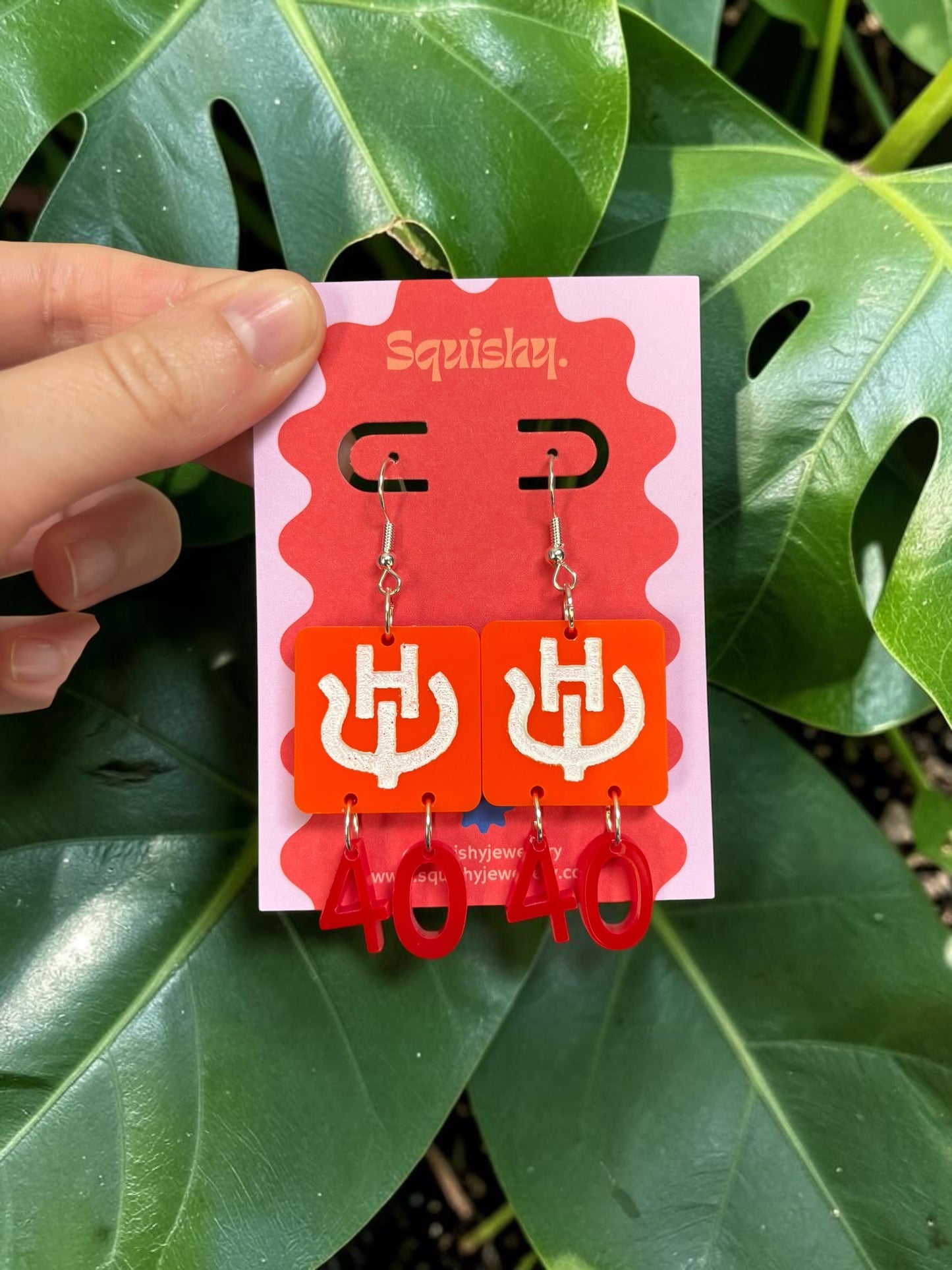Custom branded acrylic earrings for an organisation