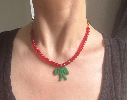 Green Bow Red Bead Necklace – Handmade Acrylic Bow Charm on Emerald Glass Beads | Cottagecore, Whimsygoth & Alt Fashion Jewellery