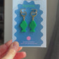 Green Fish Acrylic Earrings on Gold Huggie Hoops